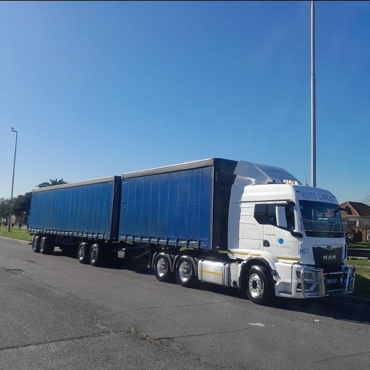 Super Link Tautliner twin-trailer truck